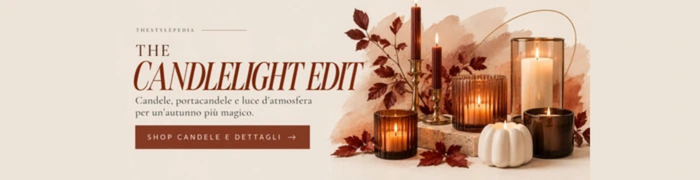 Candele e portacandele eleganti in vetro fumé, ottone e nero per creare un’atmosfera Halloween calda e sofisticata.